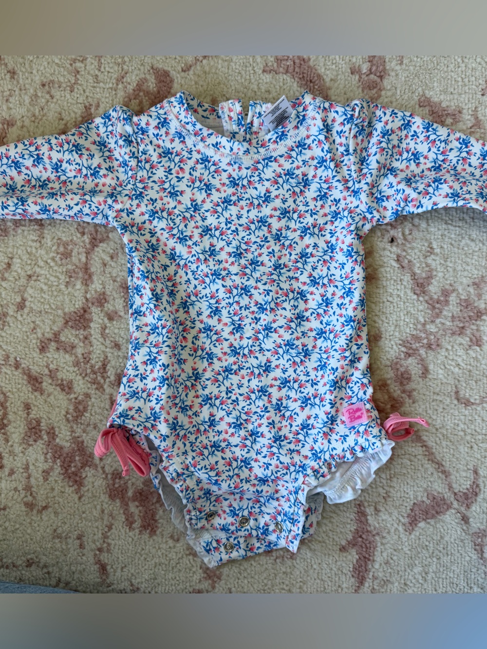 Ruffle Butts White Floral Long Sleeve Swimsuit with Pink and Blue Print